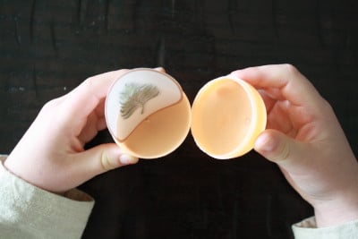 Child holding first resurrection egg open.