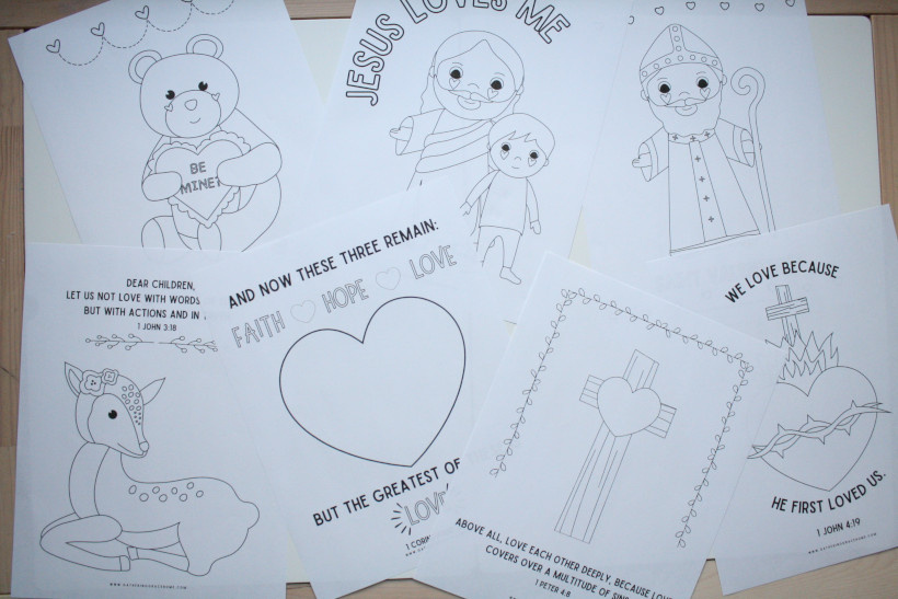Group photo of Christian Valentine's Coloring pages displayed on small children's table.